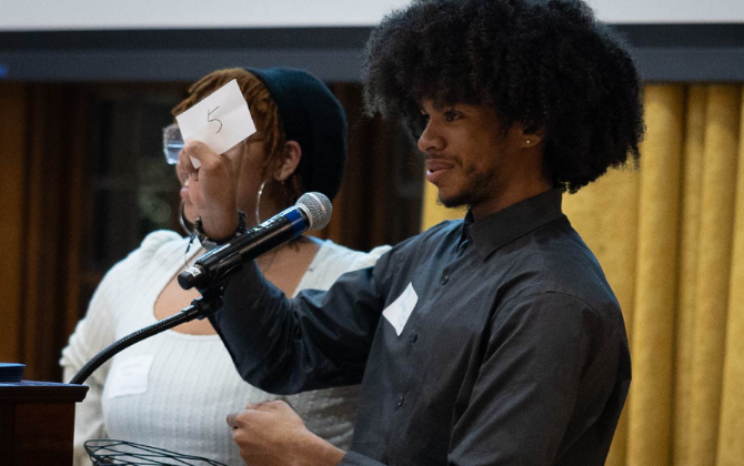 Umich student at podium 