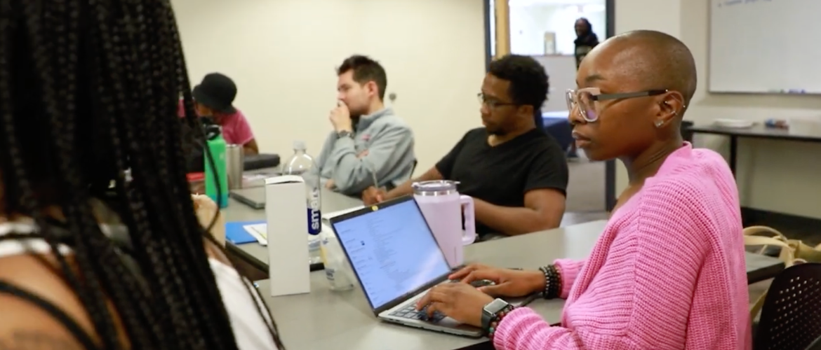 CEO students learning together at a table.