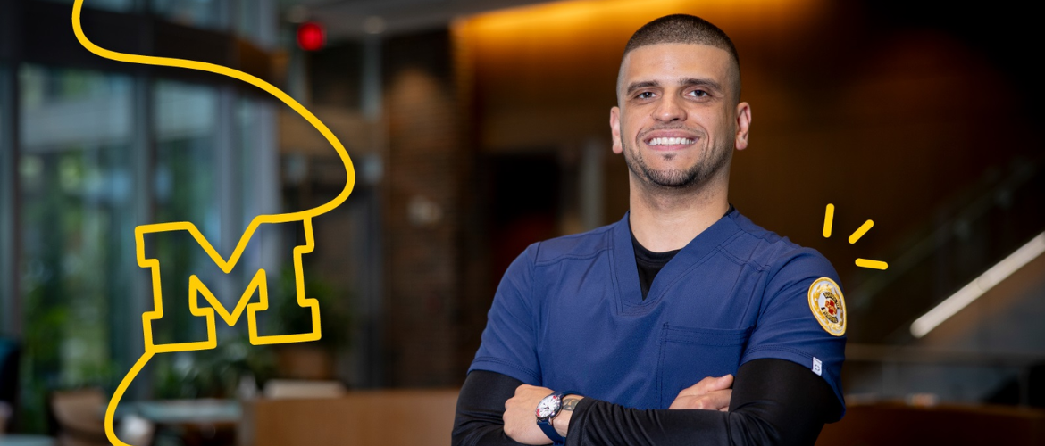 Umich nurse wearing blue scrubs.